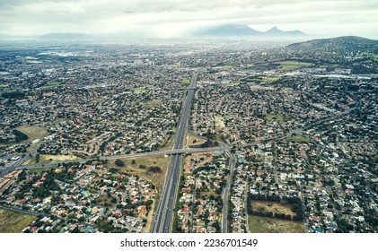 A thriving city. High angle shot of roads and freeways in and around an urban city.