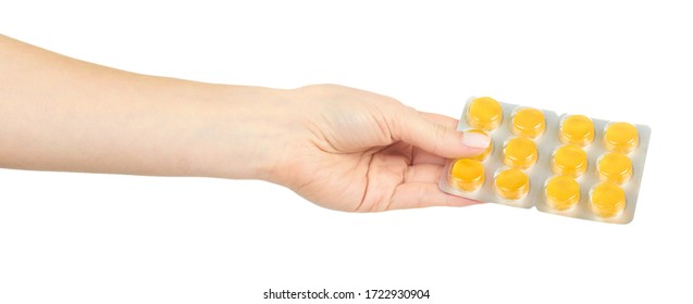Throat ache pills in bister, isolated on white background. - Shutterstock ID 1722930904
