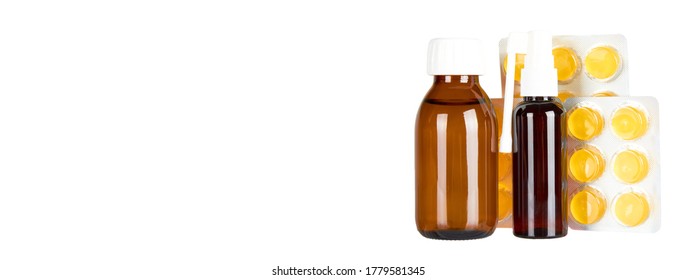 Throat ache pills in bister, spray and syrup, isolated on white background. Copy space template, banner. - Shutterstock ID 1779581345