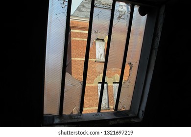 Through the Bars of an Asylum Window