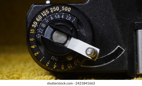 Through the lens: Capturing moments with old vintage mechanical photo camera. The photography of other times, close-up and details.