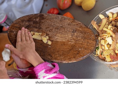 Throw carrot and potato skins into the trash. waste sorting - Powered by Shutterstock