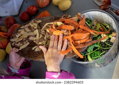 Throw carrot and potato skins into the trash. waste sorting - Powered by Shutterstock