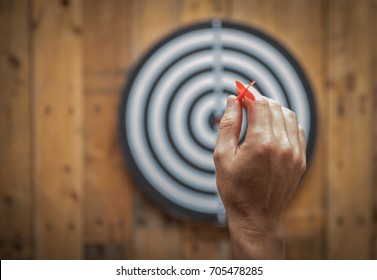 Throw darts - Shutterstock ID 705478285
