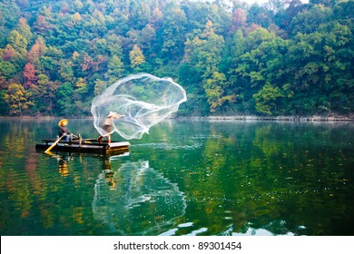 Throwing Fishing Net During Sunset