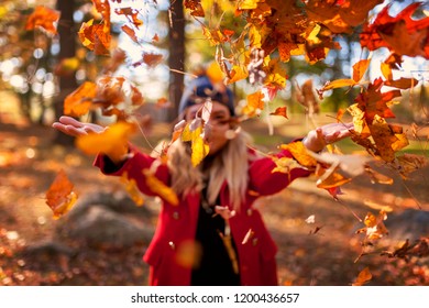 Throwing Leaves In The Park