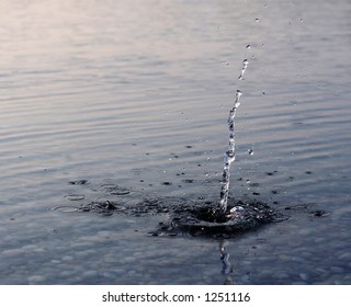 Throwing Pebbles Into Lake.