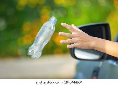 Throwing Plastic Bottle Out From Car Window