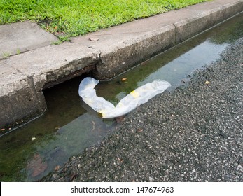 Thrown plastic bags affect dirty water drains