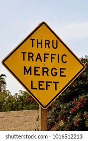 Thru Traffic Merge Left Sign