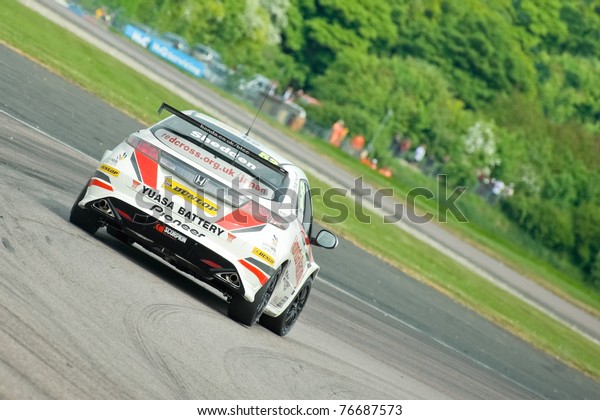THRUXTON, UNITED KINGDOM - MAY 1: Gordon Shedden in\
his Honda Racing Civic turbo heads for victory in race one of the\
British Touring Car Championship meeting on May 1, 2011 in\
Thruxton, UK.