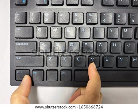 A thumb finger and pointer finger press simultaneously on keyboard at “Ctrl” key with “V” key.It is shortcut key to paste.