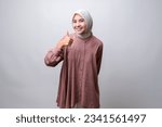 Thumb Up Sign of South East Asian Indonesian Malay Hijab Girl wih Smile