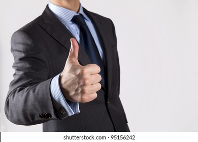Thumb up, isolated on grey background - Shutterstock ID 95156242