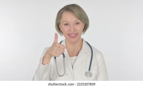 Thumbs Up By Old Female Doctor On White Background