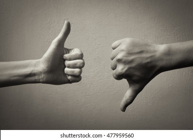Thumbs up thumbs down. Yes and no concept.  - Shutterstock ID 477959560