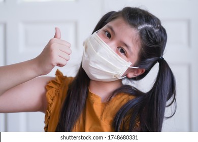 Thumbs Up Ok Tween Asian Girl Using Covid Face Mask