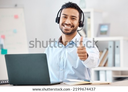 Thumbs up, call center and customer service with a man saying thank you and working in sales or telemarketing. Crm, contact us and consulting with a male consultant giving a yes gesture in an office