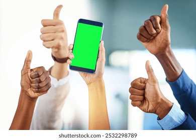 Thumbs up, green screen and business people with phone in hands for marketing, group advertising or team promo. Chroma key, mobile or like gesture for space, mockup sign or yes for sales app closeup - Powered by Shutterstock