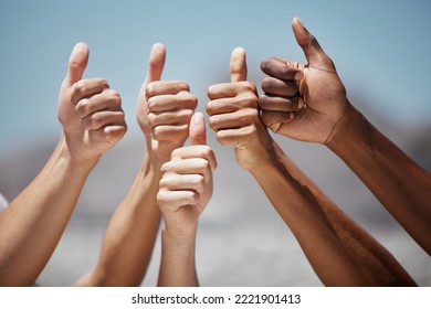 Thumbs up, hands and community fo people, friends or team together for motivation, thank you and support for vote outdoor. Group of men and women together for yes sign review for teamwork and success