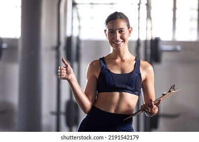 Thumbs Up, Personal Trainer And Fitness Coach With Gym Clipboard To Monitor Health, Weight Loss And Muscle Growth. Portrait Of Excited Woman And Fit Athlete Supporting Exercise, Workout And Training