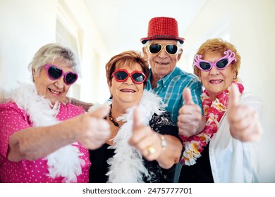 Thumbs up, smile and sunglasses with senior friends in hallway of retirement home for goofy party on weekend. Portrait, funny and eyewear with happy mature people having fun in elder care apartment - Powered by Shutterstock