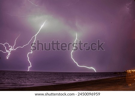 Thunder and lightning light up the sky