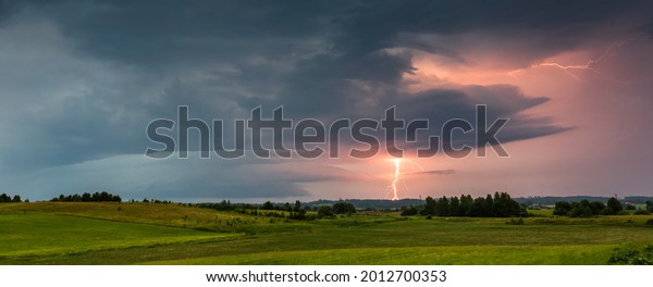 Thunder\
lightning storm clouds with lot of ligtning\
bolts