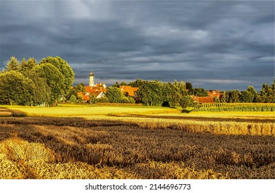 Thunderclouds over an agricultural field. Agriculture farm under thunderclouds. Farmland under thunderclouds. Agriculture farm field under thunderclouds