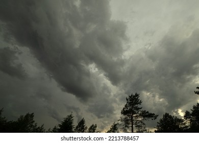 Thunderclouds in the sky. Cloudy sky over the forest.Waiting for a hurricane.