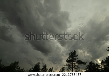Thunderclouds in the sky. Cloudy sky over the forest.Waiting for a hurricane.