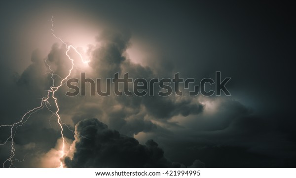 Thunderstorm Clouds with\
Lightning