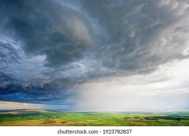 Thunderstorm with clouds and rains over the steppes and mountains of Khakassia park chests
