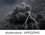 thunderstorm with dark clouds and lightning.