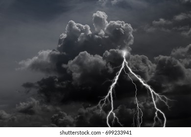 thunderstorm with dark clouds and lightning.