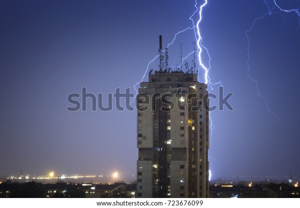 Thunderstorm over night
city