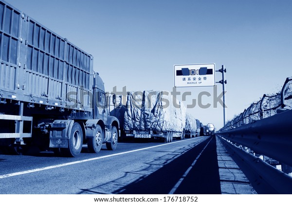 TIANJIN - DECEMBER 9: Heavy duty trucks were stopped on\
the highway Because of the traffic jam, on December 9, 2013,\
tianjin, China.  