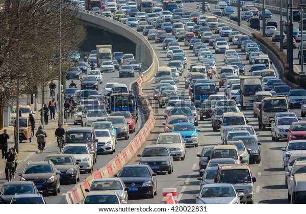 Tianjin,China - March\
26,2016 : City traffic, traffic jams, a stream of cars in rush hour\
in Tianjin city\
China.