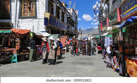 Tibet, China - Aug 30, 2012. People at downtown in Lhasa, Tibet, China. Tibet is a historical region covering much of the Tibetan Plateau in Central Asia.