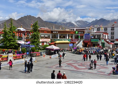 Tibet, Lhasa, China, June, 03, 2018. People walking near the checkpoint to the main square in the historical center of Lhasa. Tibet, China