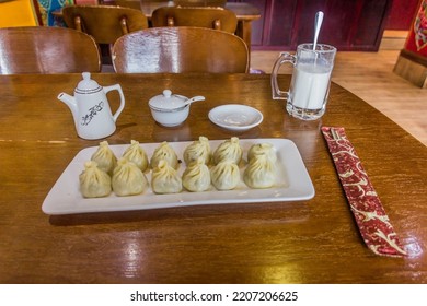 Tibetan Meal - Momos Dumplings And Yak Milk.