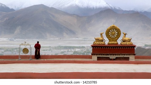 Tibetan Monk On Top Of Drepung Monastery