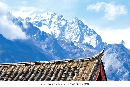 Tibetan Plateau roof top in front of snow covered himalayas