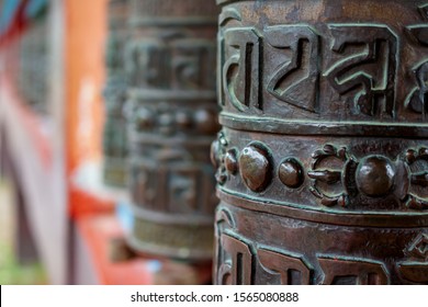 A Tibetan prayer wheel with mantra “Om Mani Padme Hum” written in Newari language of Nepal. Translation of this text  "sacred jewel in the lotus"