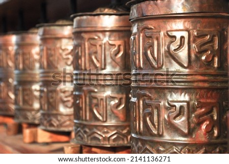 Tibetan prayer wheels at Stupa of Epuyen.The stupa, or Buddhist temple, of Epuyén is the largest and southernmost in the country. It has perfect geometry.
