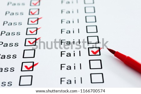 Tick boxes for Pass or Fail with pen.
