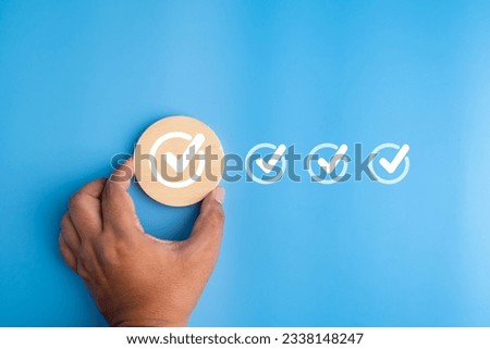 tick correct sign mark in checkbox for quality document control checklist and business approve project concept.