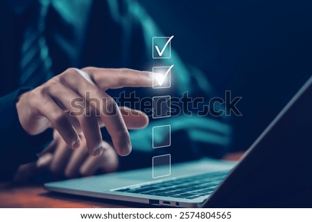 tick mark evaluation in the options check form online on a laptop. checklist concept, task audit in a list of documents. verify task detail business, process order. tick the checkmark in the survey it