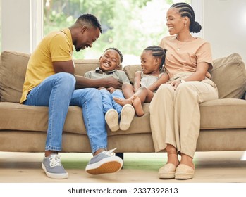 Tickling, laughing and black family with children on home sofa for happiness, love and care. African kids, man and a woman or parents together on couch for fun, quality time and bonding while playing