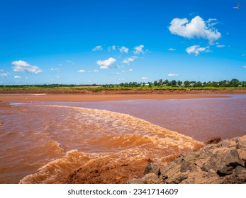 Tidal Bore at Fundy Discovery Site in Truro with oceanside tides traveling upstream on the Salmon River in Nova Scotia, Canada